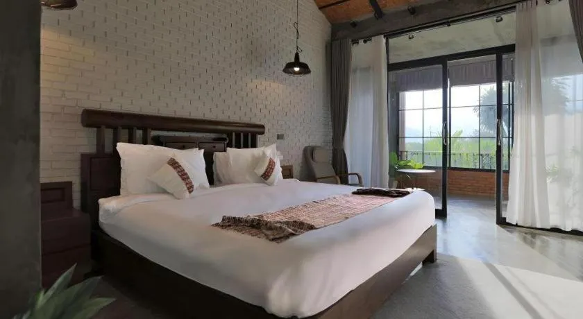 Bed in Cocoa Valley Resort