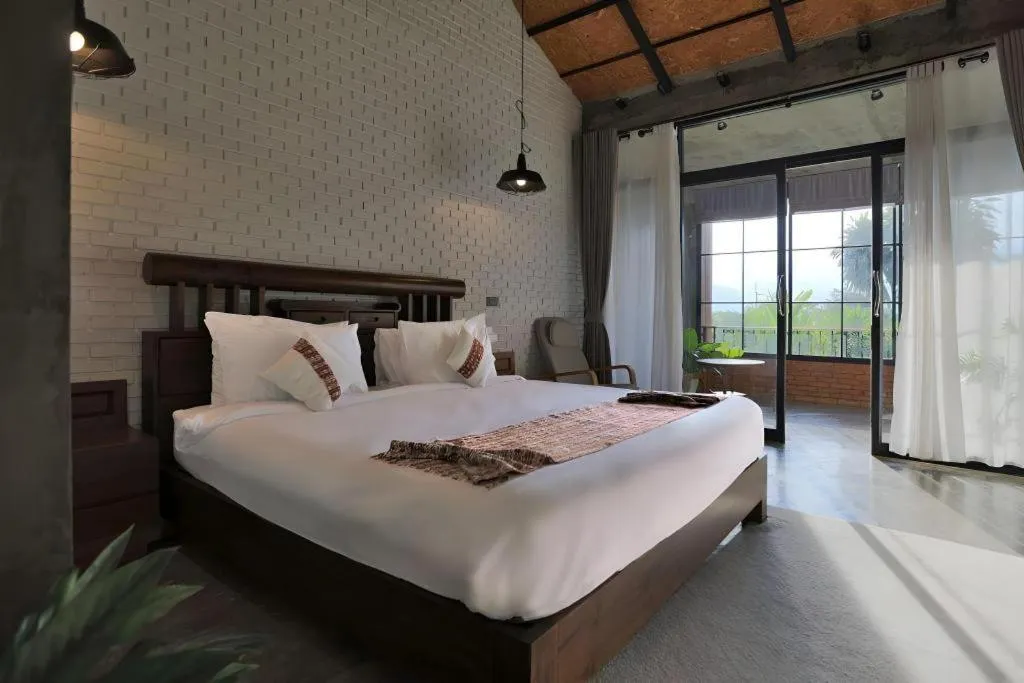 Bed in Cocoa Valley Resort