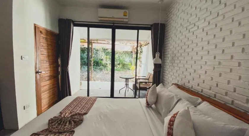 Bed in Cocoa Valley Resort