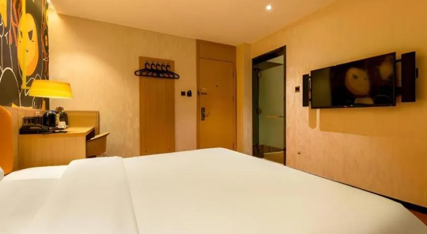 Bed in IU Hotel Tianjin Xiqing Zhong Bei Zhen Branch