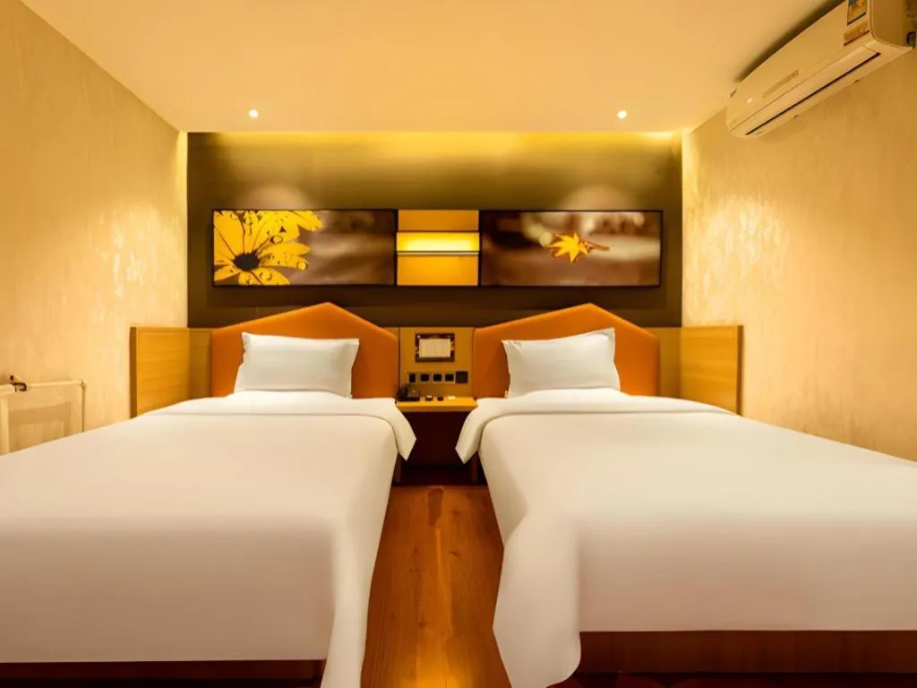 Bed in IU Hotel Tianjin Xiqing Zhong Bei Zhen Branch