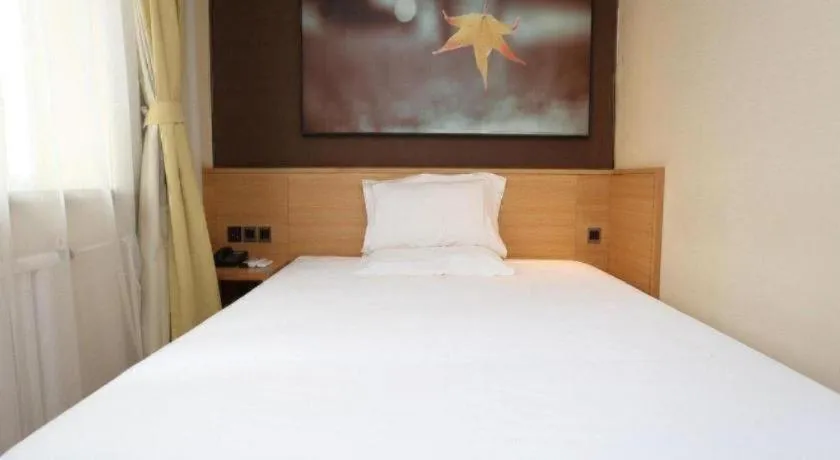 Bed in IU Hotel Tianjin Xiqing Zhong Bei Zhen Branch