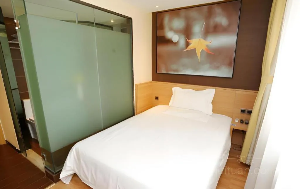 Bed in IU Hotel Tianjin Xiqing Zhong Bei Zhen Branch