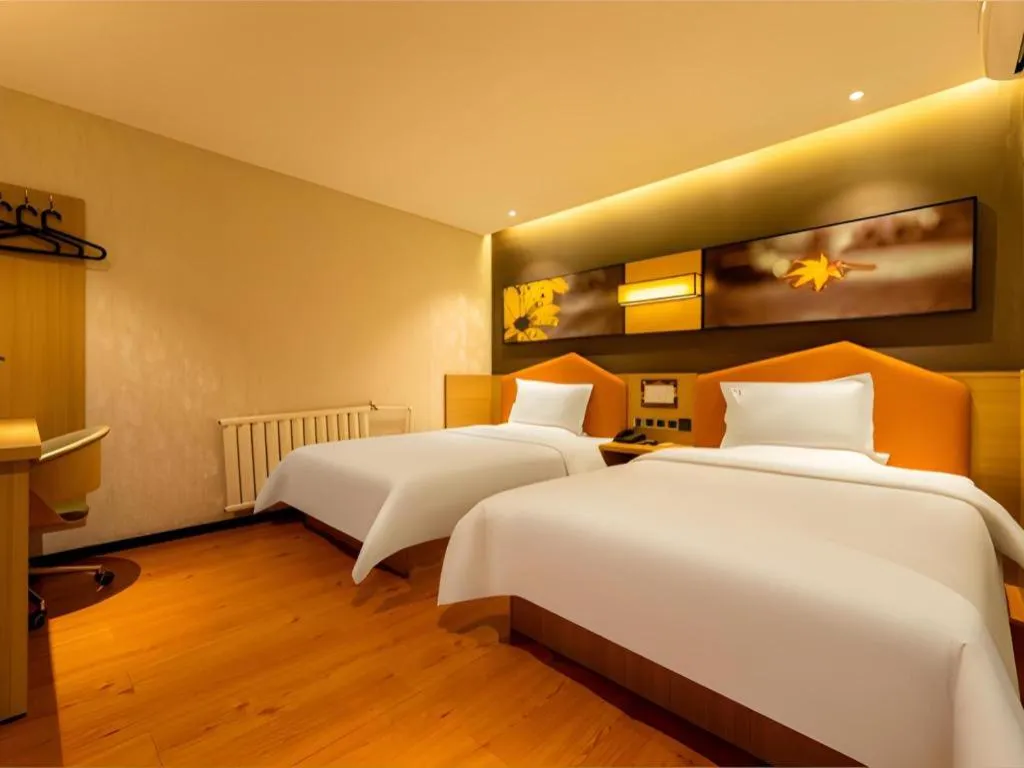 Bed in IU Hotel Tianjin Xiqing Zhong Bei Zhen Branch