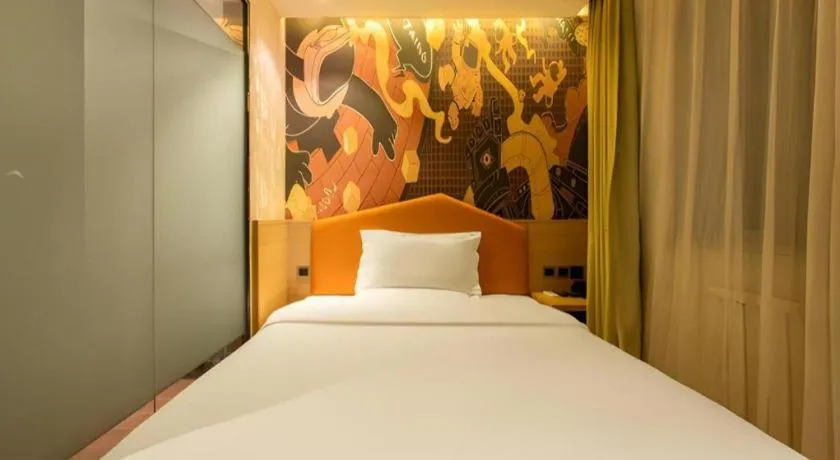 Bed in IU Hotel Tianjin Xiqing Zhong Bei Zhen Branch