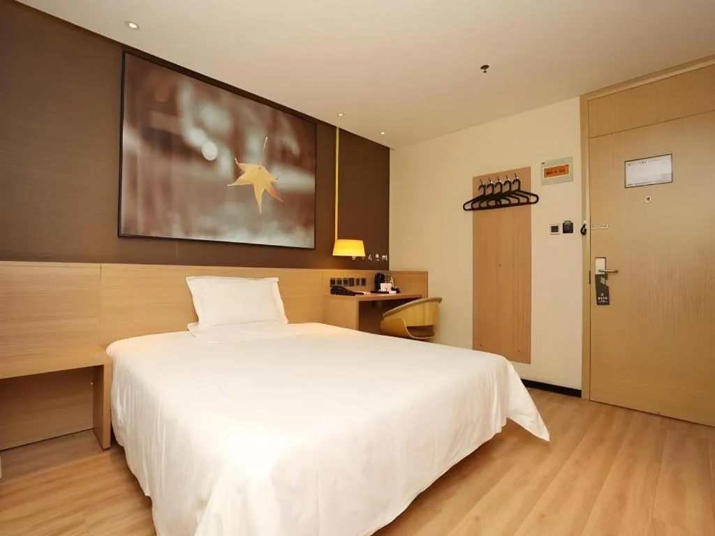 Bed in IU Hotel Tianjin Xiqing Zhong Bei Zhen Branch