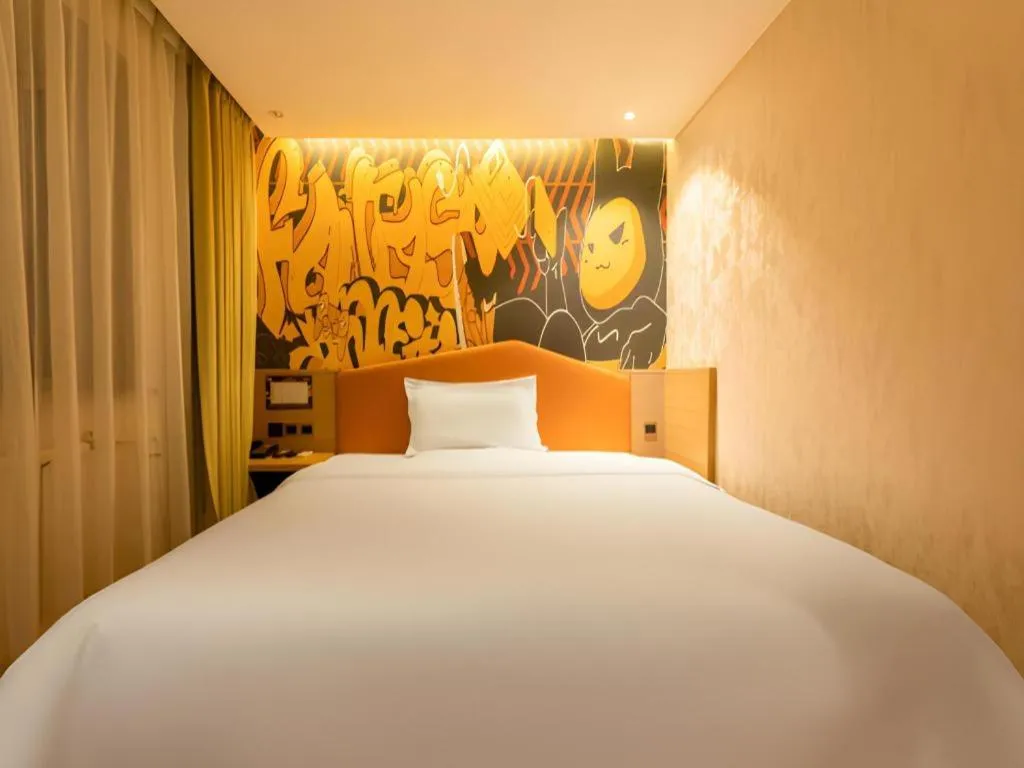 Bed in IU Hotel Tianjin Xiqing Zhong Bei Zhen Branch