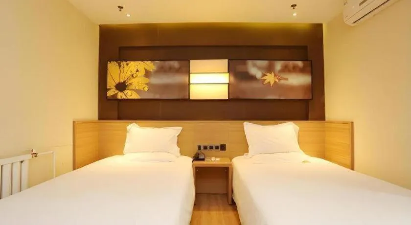 Bed in IU Hotel Tianjin Xiqing Zhong Bei Zhen Branch