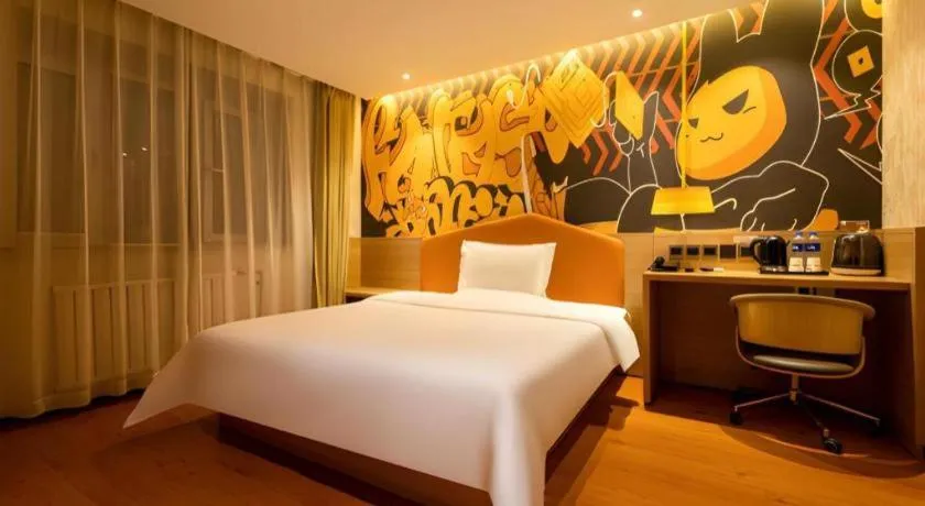 Bed in IU Hotel Tianjin Xiqing Zhong Bei Zhen Branch