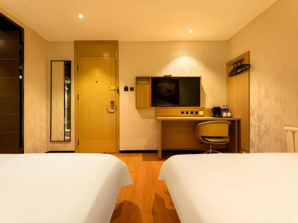 Bed in IU Hotel Tianjin Xiqing Zhong Bei Zhen Branch