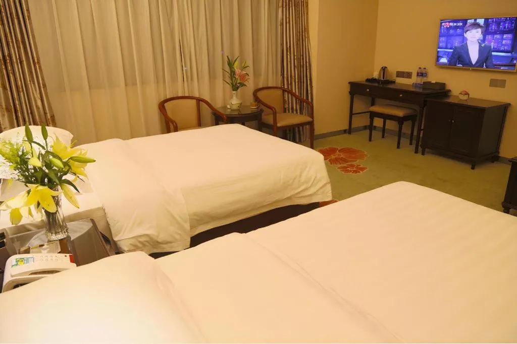 Bed in Gui Feng Hotel