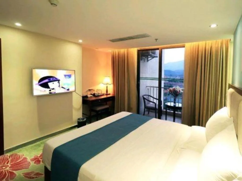 Bed in Gui Feng Hotel