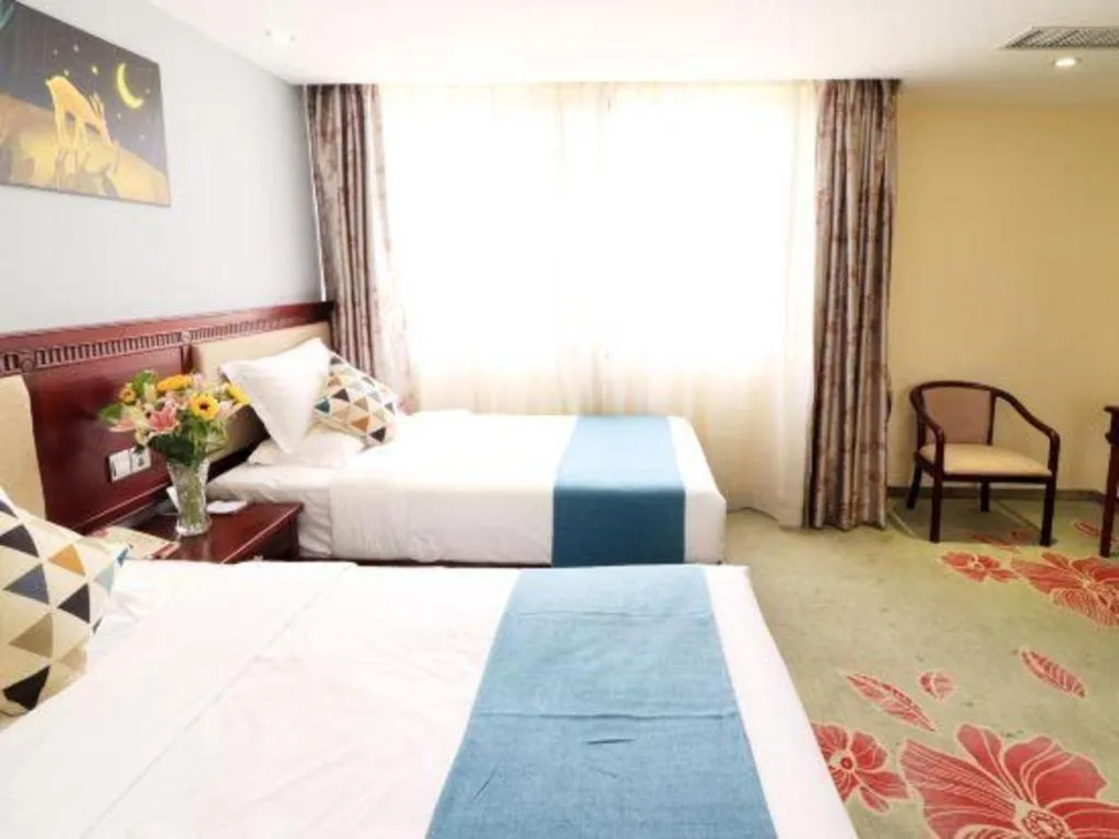 Bed in Gui Feng Hotel