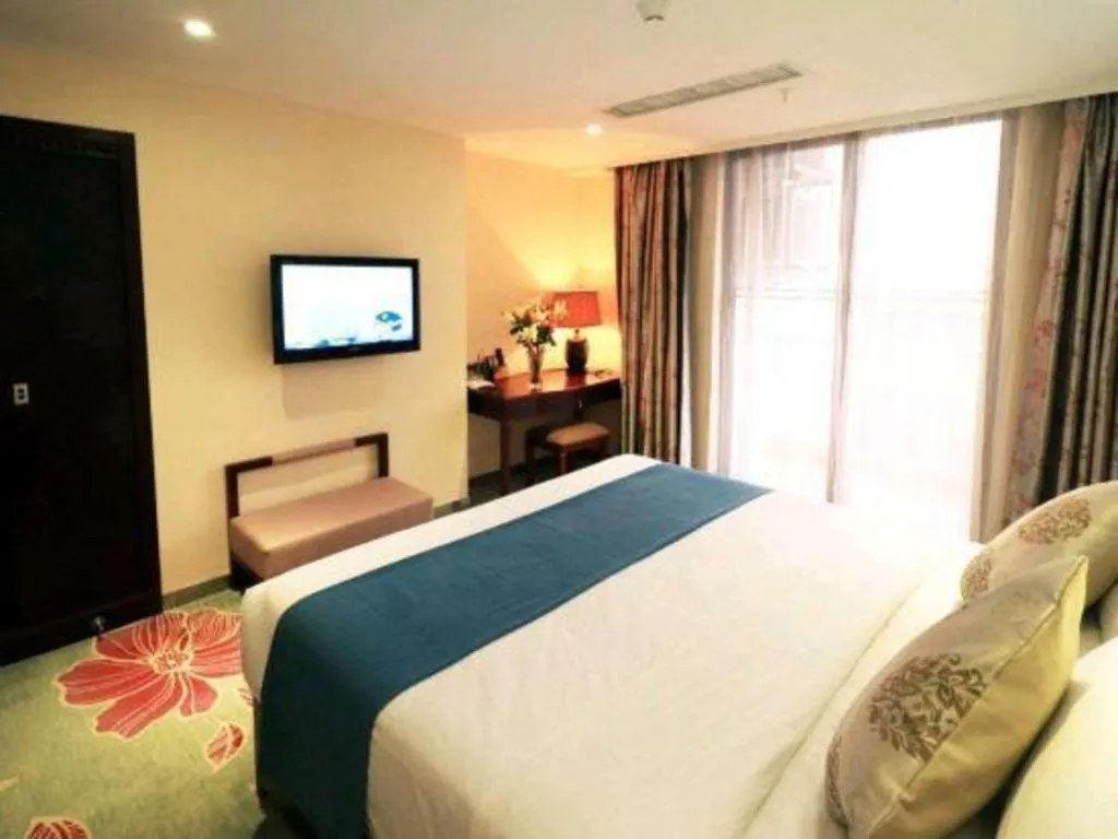 Bed in Gui Feng Hotel