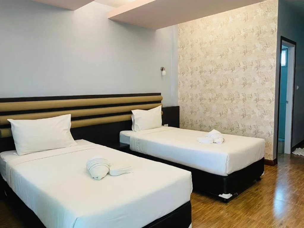 Bed in Phuphayot Resort