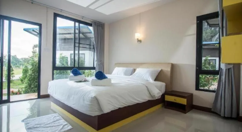 Bed in Phuphayot Resort