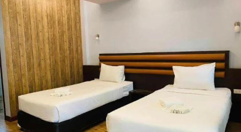 Bed in Phuphayot Resort