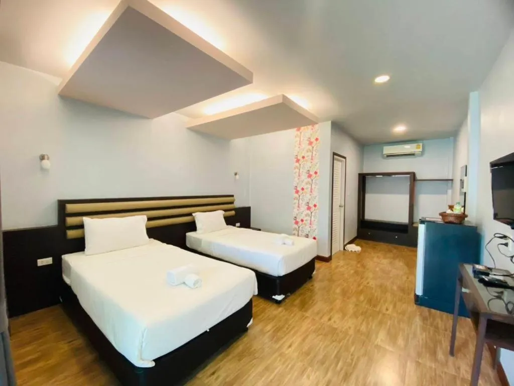 Bed in Phuphayot Resort