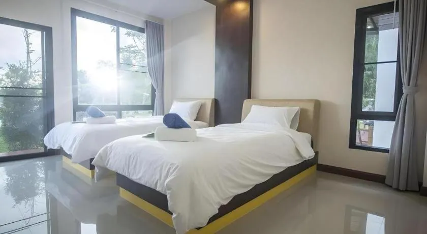 Bed in Phuphayot Resort
