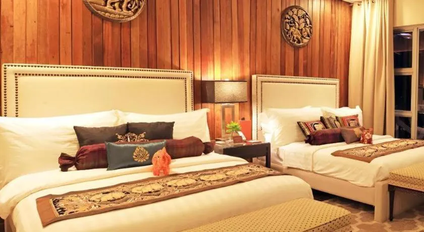 Bed in The Oriental Luxury Suites Tagaytay