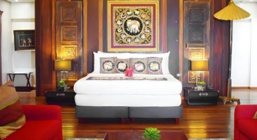 Bed in The Oriental Luxury Suites Tagaytay