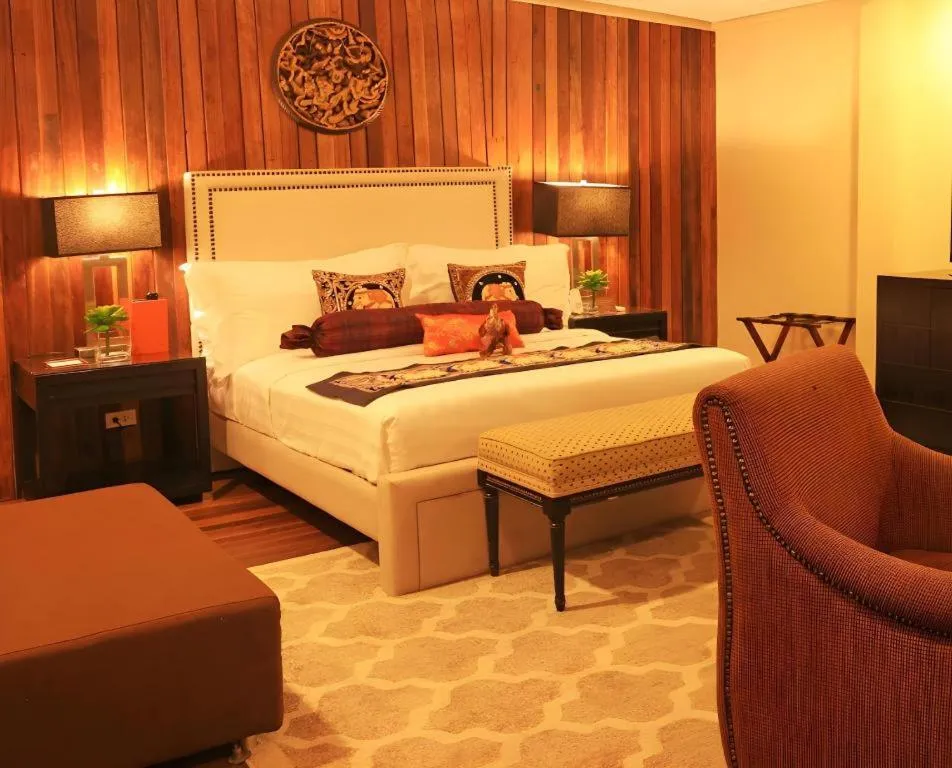 Bed in The Oriental Luxury Suites Tagaytay