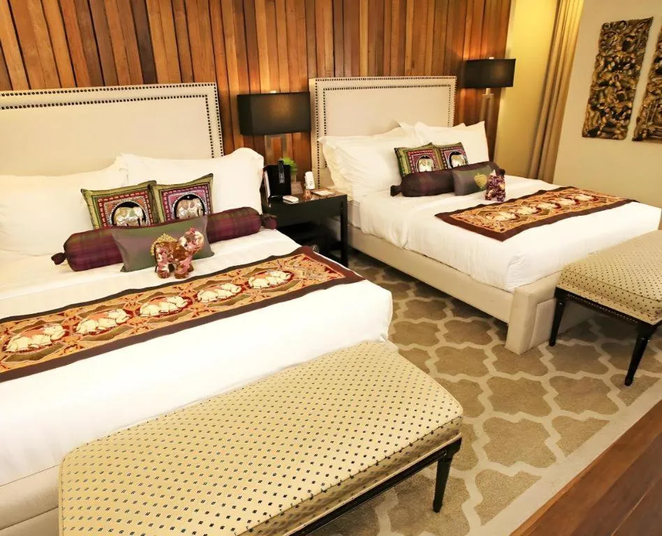 Bed in The Oriental Luxury Suites Tagaytay