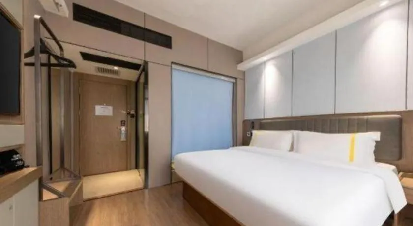 Bed in Mao Hua hotel