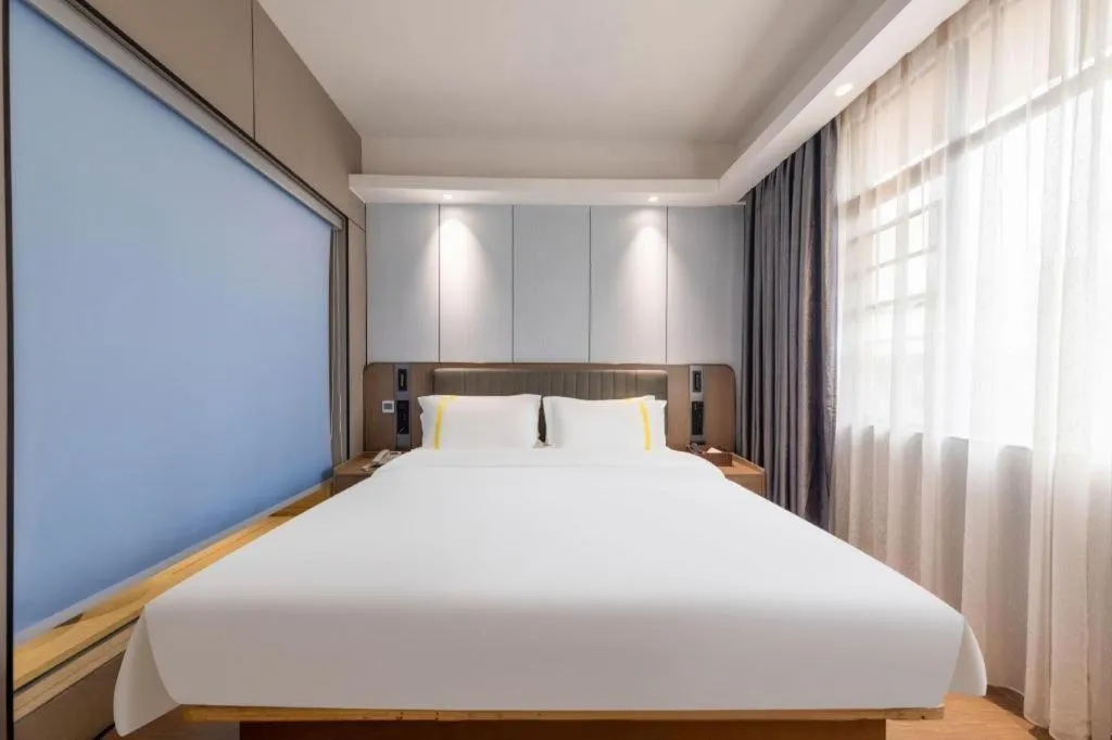 Bed in Mao Hua hotel