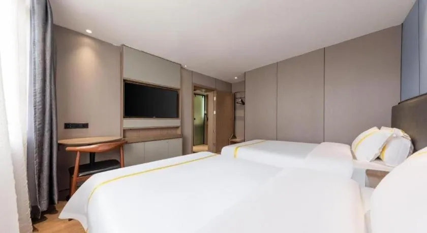 Bed in Mao Hua hotel