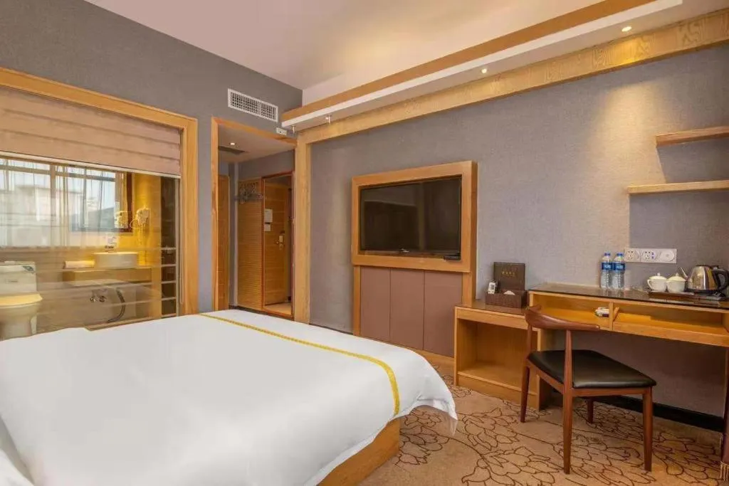 Bed in Mao Hua hotel