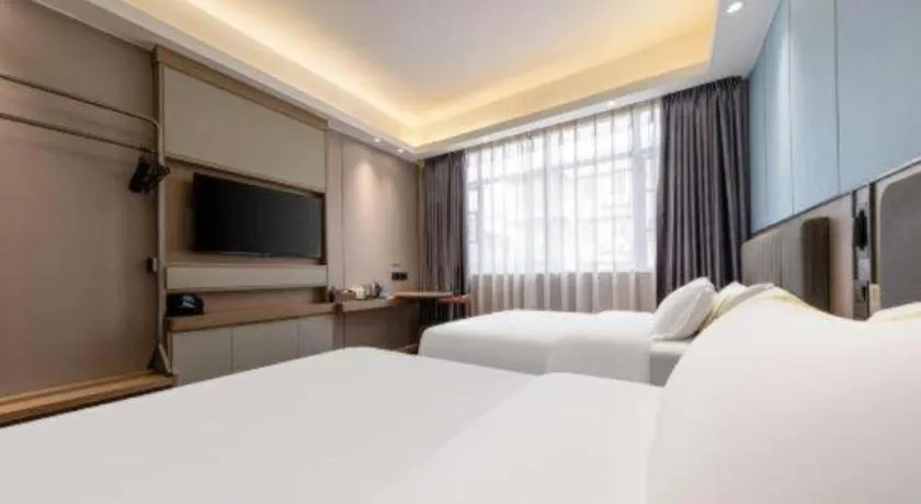 Bed in Mao Hua hotel