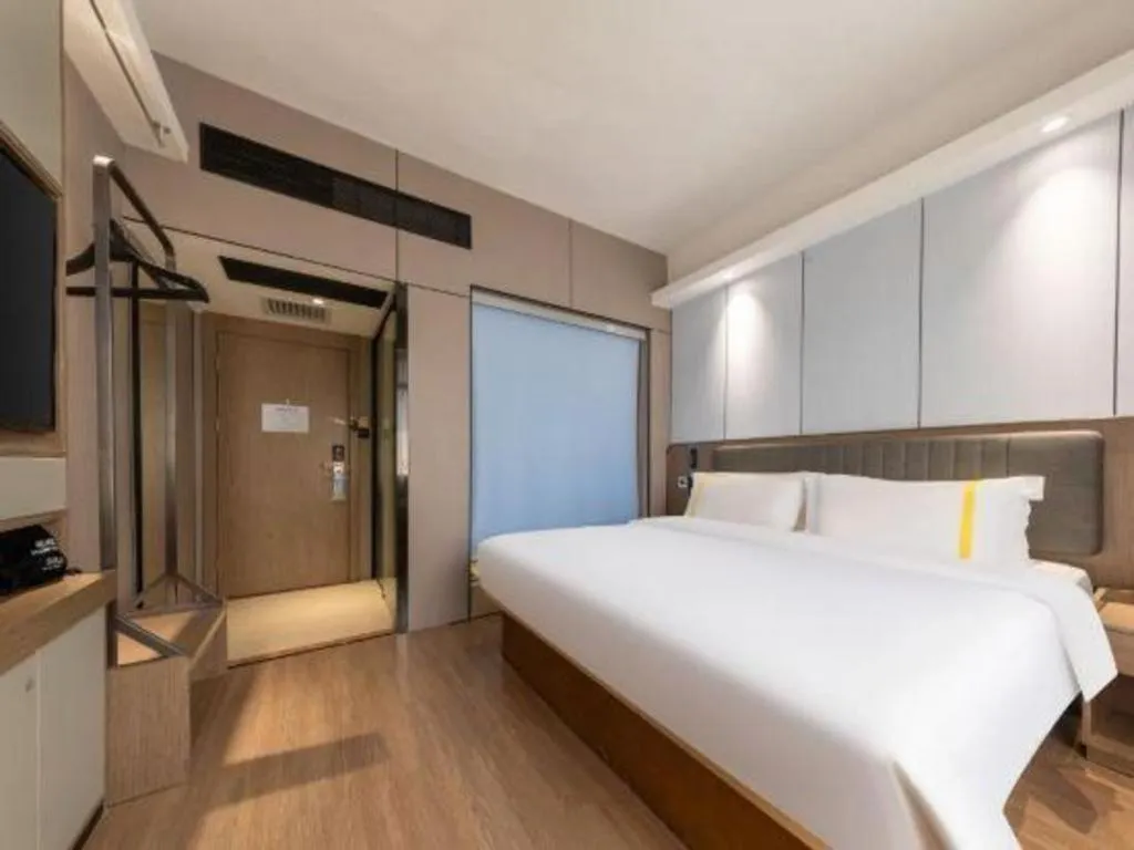 Bed in Mao Hua hotel