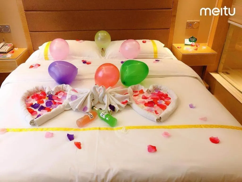 Bed in Mao Hua hotel