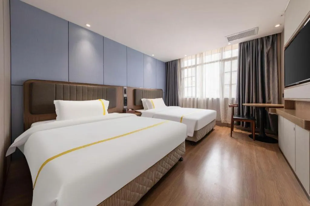 Bed in Mao Hua hotel