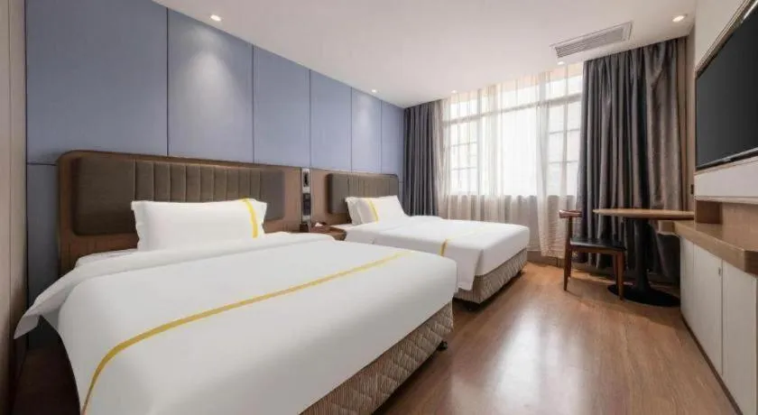 Bed in Mao Hua hotel