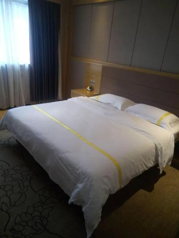 Bed in Mao Hua hotel
