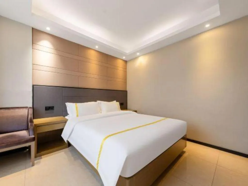 Bed in Mao Hua hotel