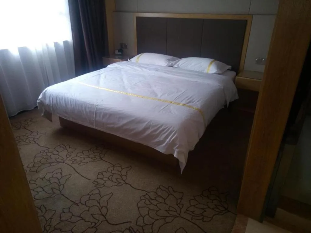 Bed in Mao Hua hotel