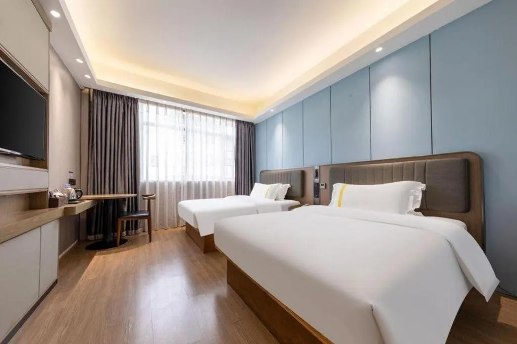 Bed in Mao Hua hotel