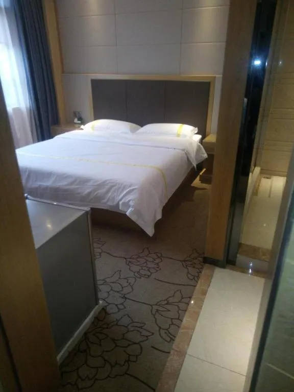 Bed in Mao Hua hotel