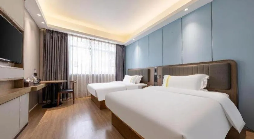 Bed in Mao Hua hotel