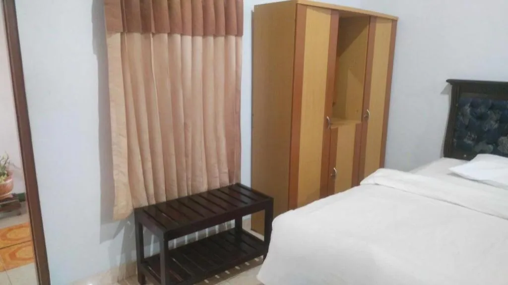 Bed in Avicenna Hotel