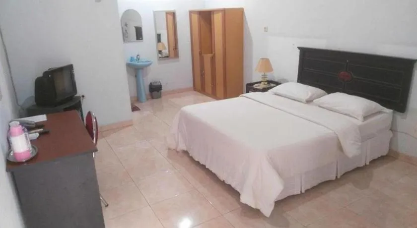 Bed in Avicenna Hotel