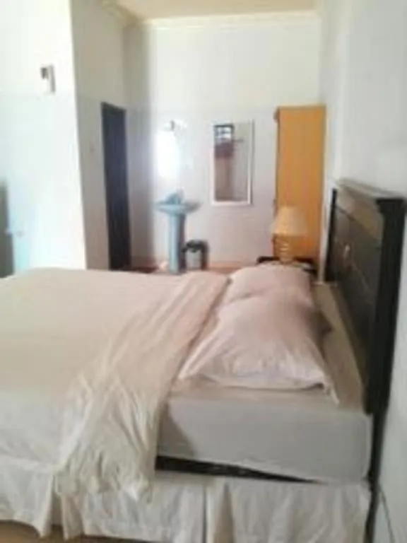 Bed in Avicenna Hotel