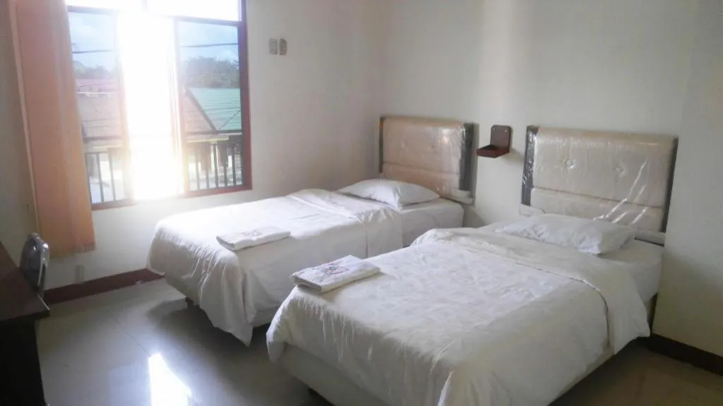 Bed in Avicenna Hotel