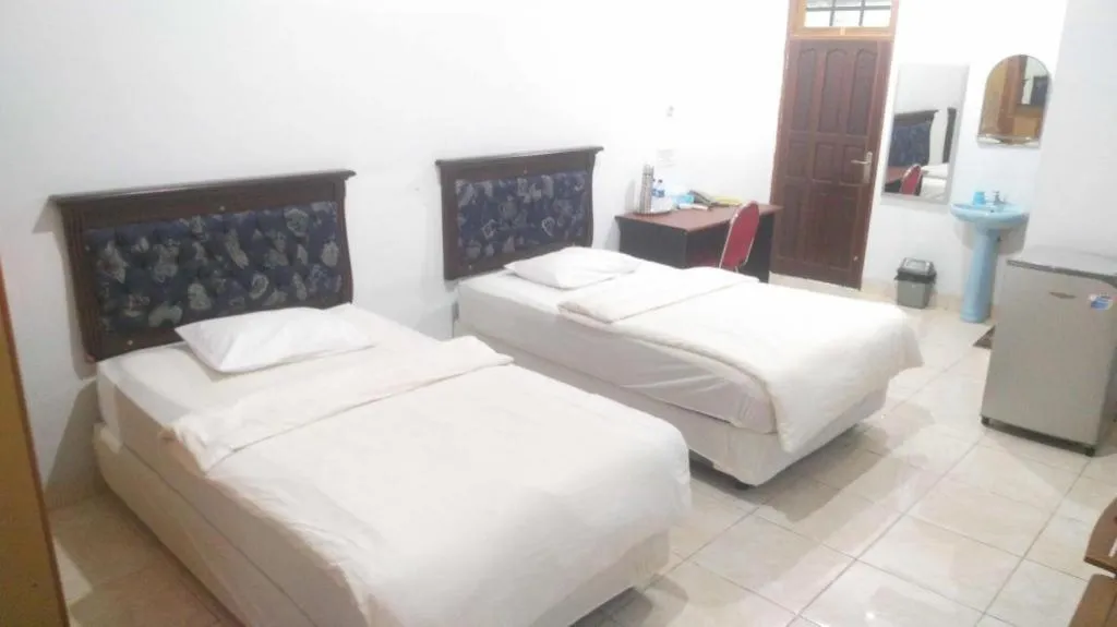 Bed in Avicenna Hotel