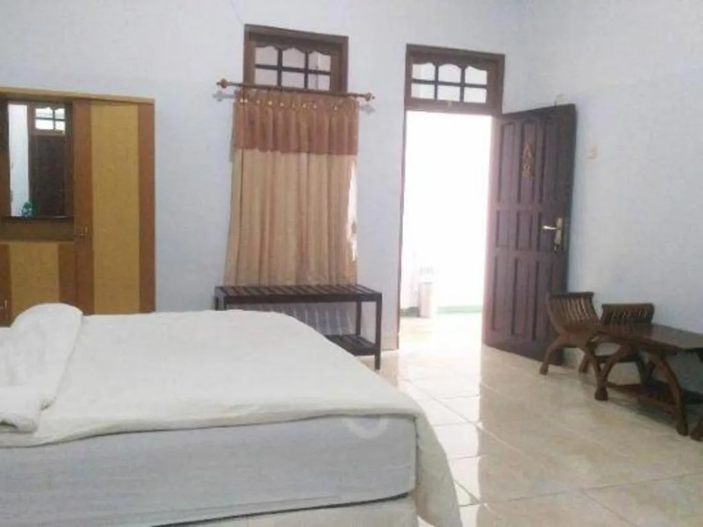 Bed in Avicenna Hotel