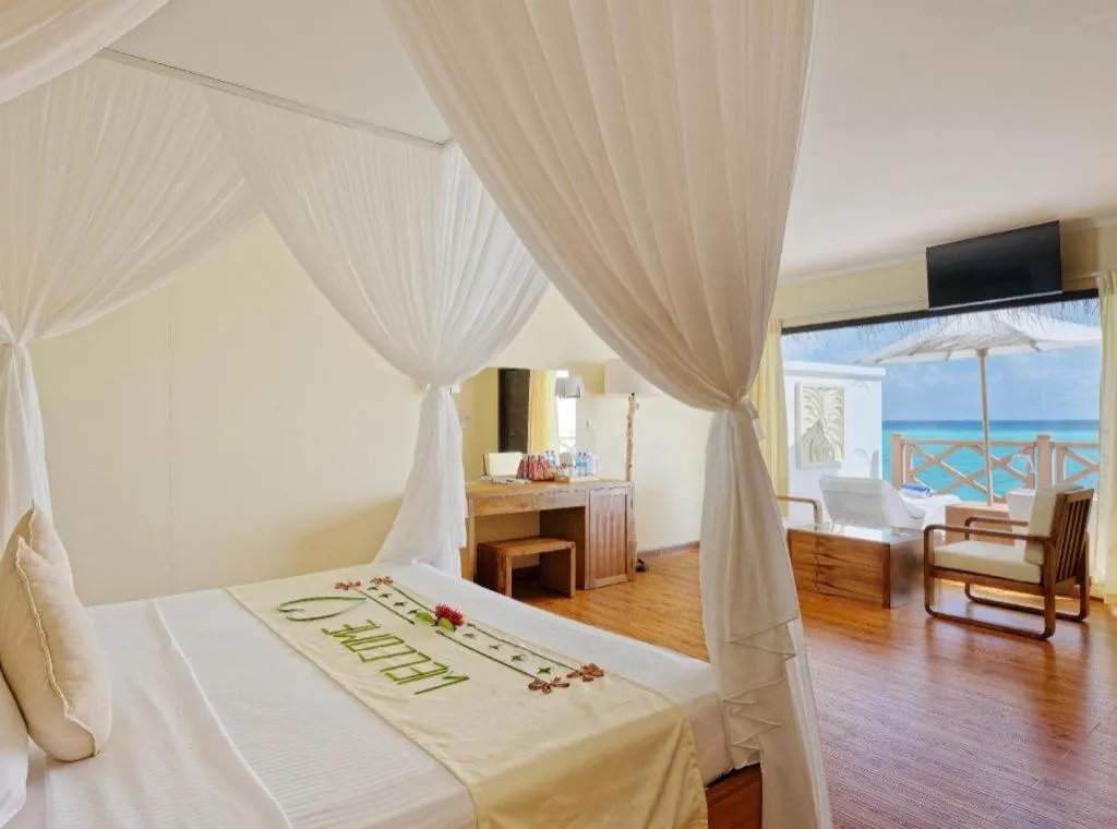 Bed in Angaga Island Resort and Spa