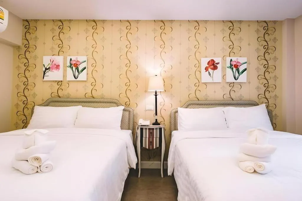 Bed in Verona Boutique Hotel - The Verona Co., Ltd